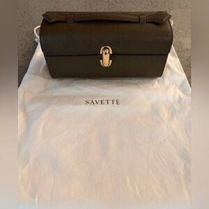 Savette Symmetry  Pouchette Bag 
Mink color with Gold Authentic NEW